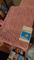 Pink bath rug